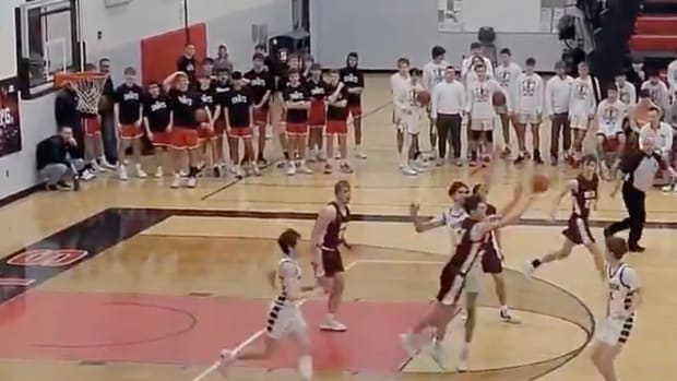 Blue Earth Area's Max Loge makes a game-winning buzzer beater from three-quarters court against Windom on Saturday, Feb. 24, 2024, at St. James Area High School in St. James, Minn.